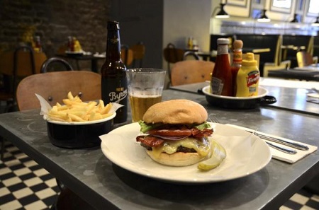 A Byron burger meal on a restaurant table