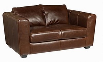 A comfortable Manhattan sofa in brown faux leather for a hotel lobby