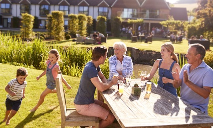 A family enjoying a pub garden