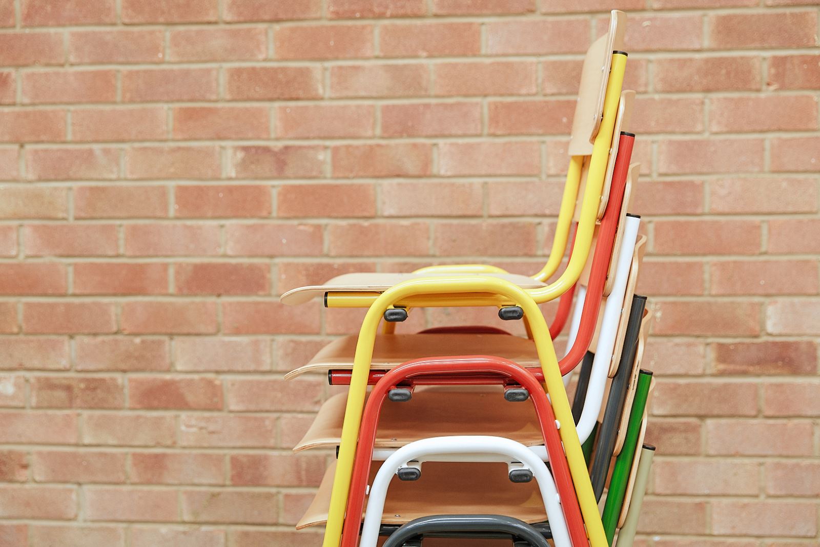 Stacking chairs in various colours