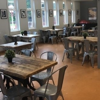 Timeless Tolix style chairs chosen by the Buffer Stop Café